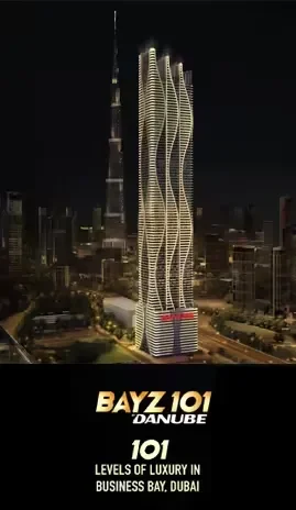 Bayz 101 tower in Business Bay, Dubai with the iconic Burj Khalifa in the background